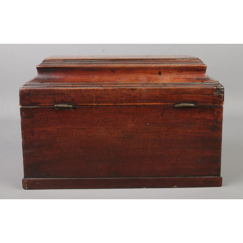 124 - A 19th century mahogany tea caddy.