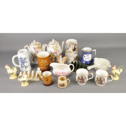 176 - A collection of ceramics including S Hancock & Sons tea pots, Delfts Blue tankard, Fine Derbyshire P... 