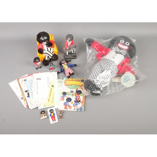 177 - A quantity of Robertson's Golly collectables to include money box, DSN toy, figure, etc.