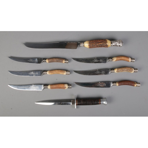 18 - A collection of assorted knives to include set of six James Dixon horn handled steak knives, one unm... 