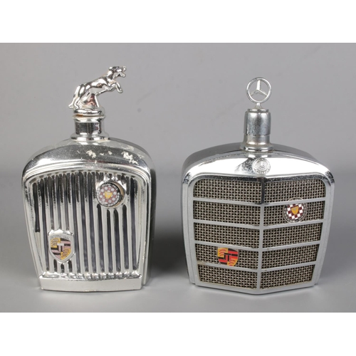 27 - Two novelty decanters in the form of vintage car grills one being Mercedes the other Jaguar.