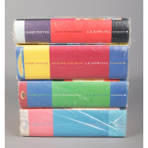 31 - Four hardback Harry Potter First Edition books, by JK Rowling. In protective plastic covers. Consist... 