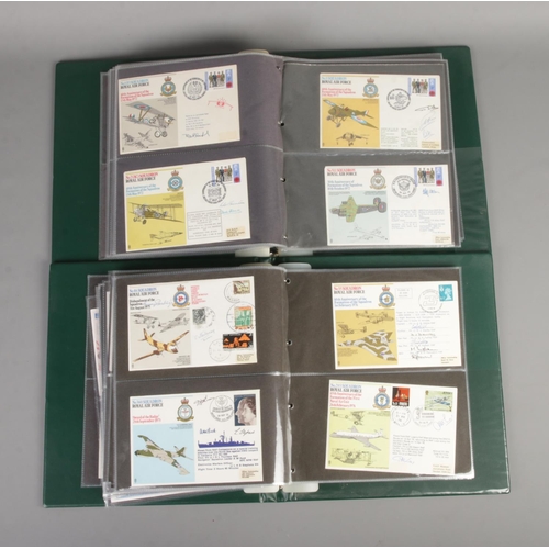 57 - Two albums of RAF first flown covers to include many signed and multi-signed examples. Approx. 155 c... 