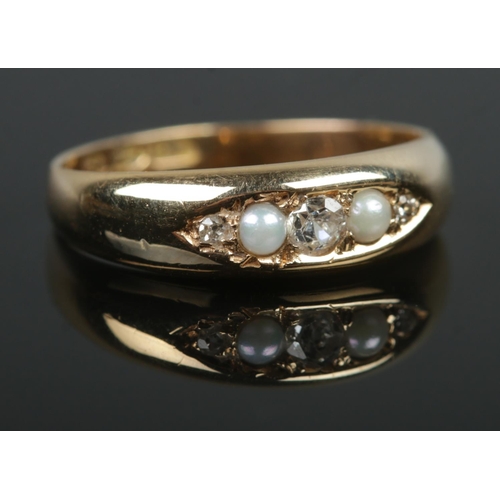 387 - A late Victorian 18ct Gold diamond and pearl five stone diamond ring. Assayed for Chester 1899. W.M ... 