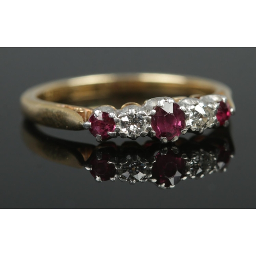 388 - An 18ct Gold and Platinum Ruby and Diamond five stone ring. Size K. Total weight: 2.3g.