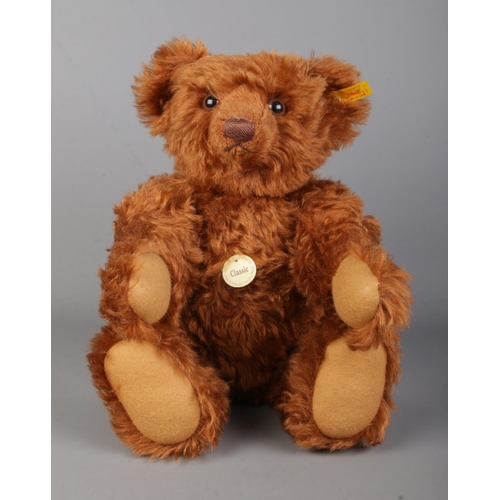 6 - A Steiff Classic replica mohair teddy bear, with gold button in ear (004513) and tilt growler. Sat h... 