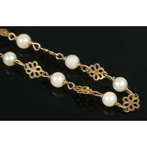 399 - A 9ct Gold floral link necklet, set with cultured pearls. Assayed for London, 1975. Length unclasped... 