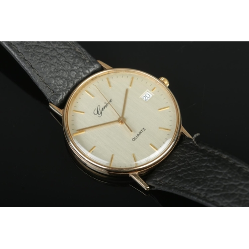 400 - A Gents Geneve 9ct Gold cased quartz wristwatch, on black leather strap. Weight of back plate: 2.9g.