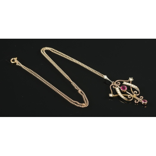 401 - A 9ct Edwardian style Garnet and Pearl pendant, suspended on dainty 9ct Gold chain. Total weight: 3.... 