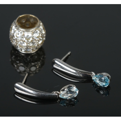 416 - A collection of 10ct white gold to include pair of topaz drop earrings and cubic zirconia set bracel... 