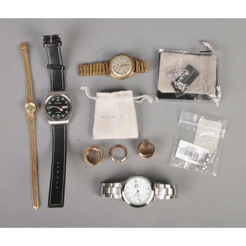 417 - A small collection of costume jewellery and wristwatches to include Michael Kors rings, Aria Incablo... 