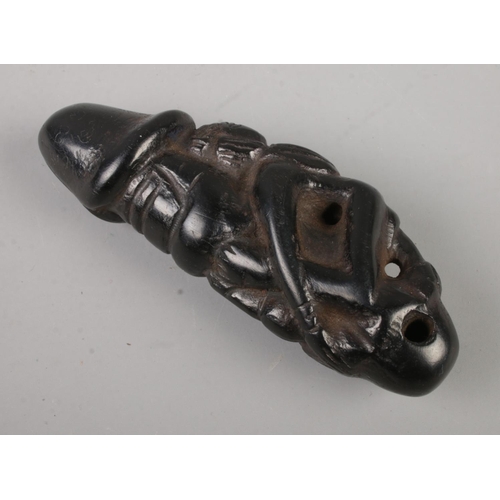 420 - An erotic ebony wood oriental carved amulet