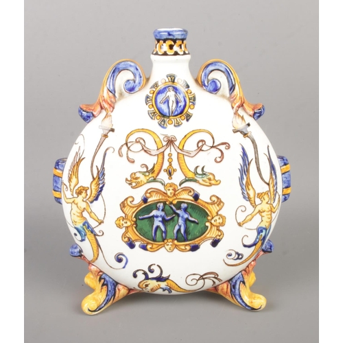 68 - A 19th century French Gien pottery moon flask heavily decorated with assorted mythical creatures. Ap... 