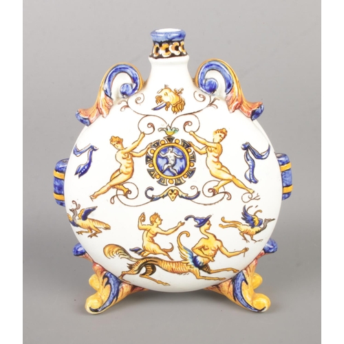 68 - A 19th century French Gien pottery moon flask heavily decorated with assorted mythical creatures. Ap... 