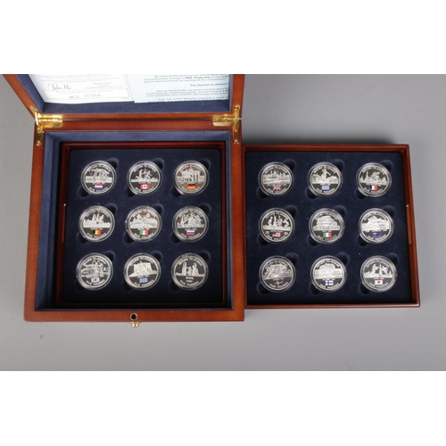 430 - The Westminster Collection; A cased set of eighteen silver proof Gibraltar £5 coins, dated 2004 and ... 