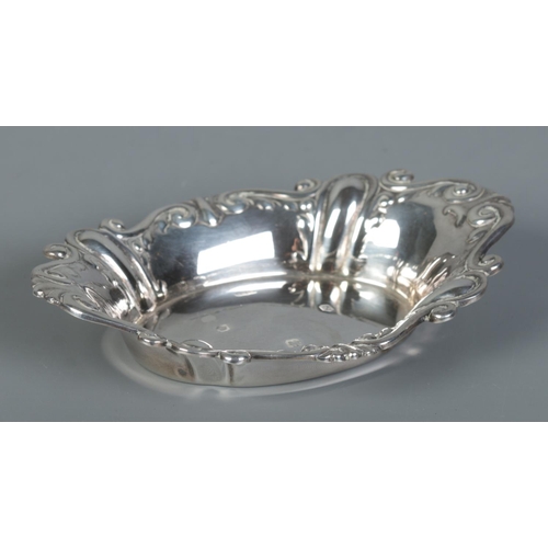 432 - A lozenge shaped silver bon-bon dish with scrolled rim. Assayed for Sheffield, 1967 by James Dixon &... 