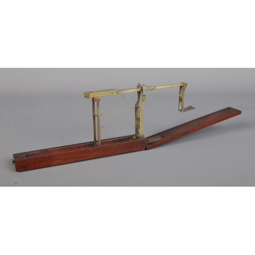 435 - A set of Daniel Robinson folding brass coin scales, possibly for either Guineas or Sovereigns. In hi... 