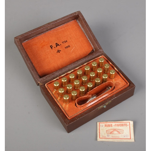 436 - A Second World War era watchmakers drill bit set; F.A. 7754, bearing military broad arrow mark and d... 