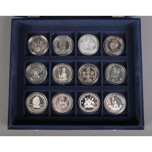 442 - A collection of twelve silver proof coins, mainly commemorative examples. Includes 2003 Bank of Ugan... 