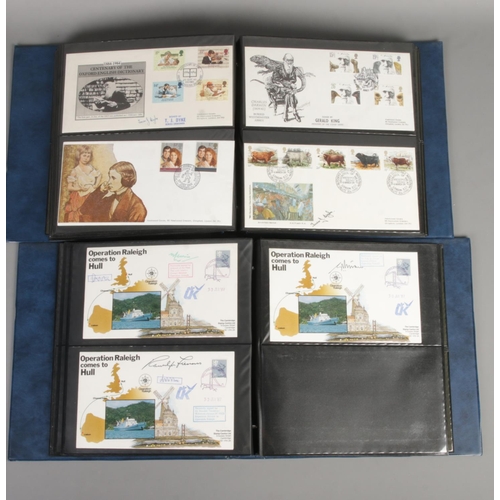 73 - Two albums of first day covers to include Operation Raleigh Comes To Hull (set of 19) featuring sign... 