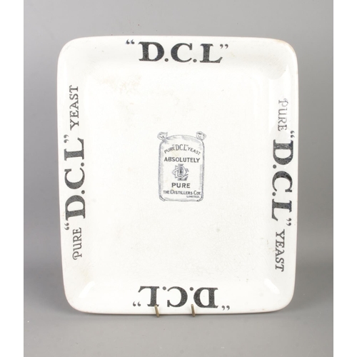 445 - A Nineteenth Century ironstone Grocer's plate advertising Pure D.C.L Yeast. 33cm x 28cm.