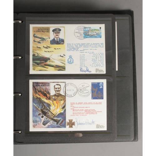 77 - An album containing a good collection of signed RAF first day covers including RAF Historic Aviators... 