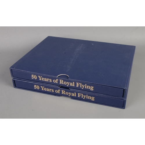 79 - Two editions of The Queen's Flight: 50 Years of Royal Flying, a collection of signed limited edition... 