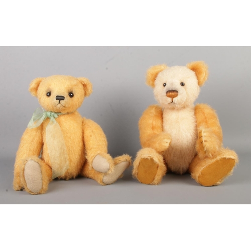 82 - Two Charlie Bears jointed teddy bears, in blonde fur. One bearing bow scarf around the neck, both wi... 