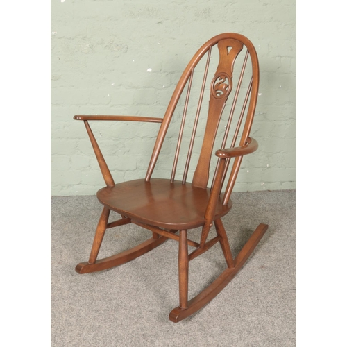 460 - An Ercol Windsor swan back rocking chair