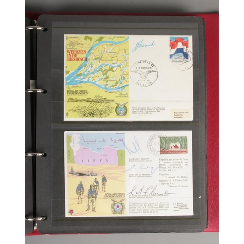 85 - An album of Royal Air Force Escaping Society Pilot signed first day covers to include multi-signed e... 