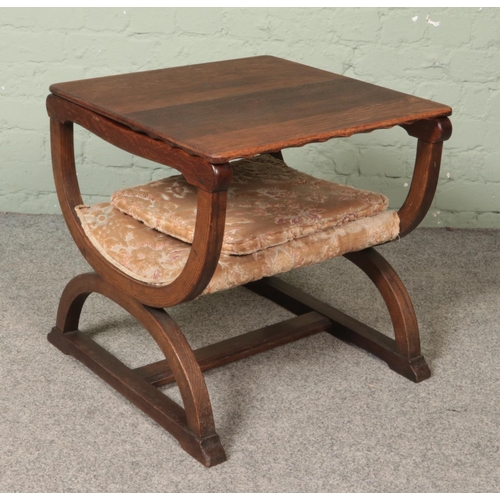 467 - An oak metamorphic arm chair/table.