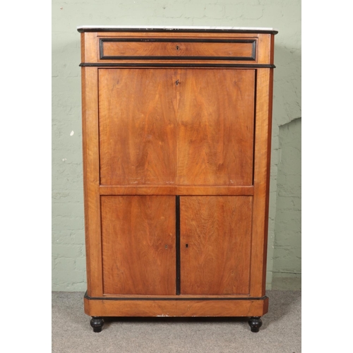 468 - A Biedermeier style walnut fall front escritoire with marble top. Height 160cm, Width 98cm, Depth 47... 