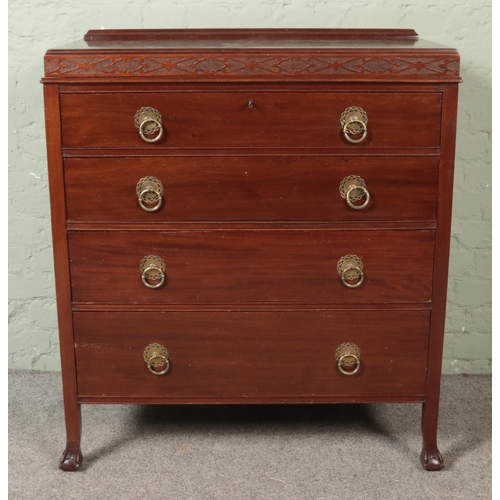 480 - An Edwardian mahogany vanity chest with three drawers and hinged top.