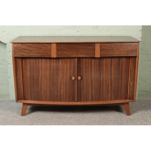 489 - A mahogany bow fronted sideboard produced by FD Welters.
Featuring three drawer above a set of tambo... 