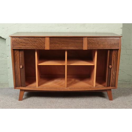 489 - A mahogany bow fronted sideboard produced by FD Welters.
Featuring three drawer above a set of tambo... 