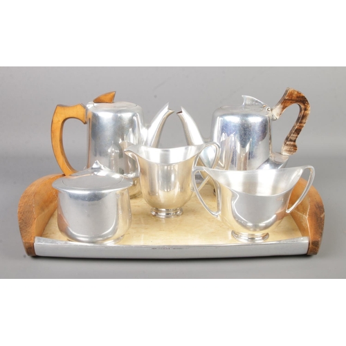 88 - A Piquot Ware tea set including tea pots, jug, sugar bowl, tray etc.