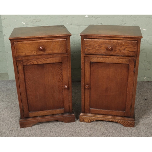 492 - A pair of oak bedside cabinets