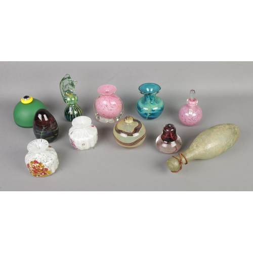 90 - A good collection of mostly Mdina art glass to include small vases, paperweights, The Glass Studio b... 