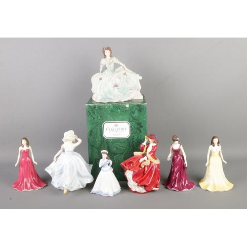 93 - Seven ceramic figurines, produced by Royal Doulton, Royal Worcester and Coalport. To include Gemston... 