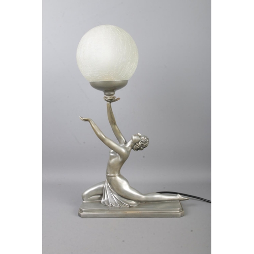 108 - An Art Deco style table lamp formed as a woman with outstretched hands supporting a spherical crackl... 