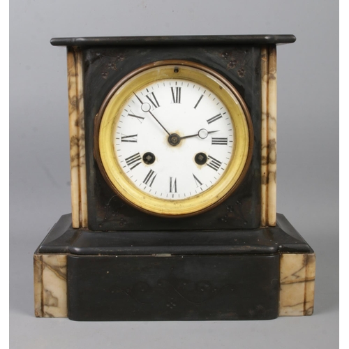 109 - A Nineteenth Century HP & Co. slate and marble mantle clock, featuring Roman Numeral markers. Chimin... 