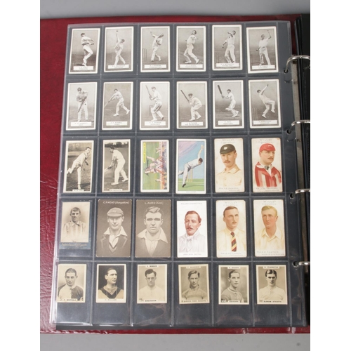 110 - A folder of assorted Sporting cigarette and trade cards to include Wills Cricketer Series 1901, Tadd... 