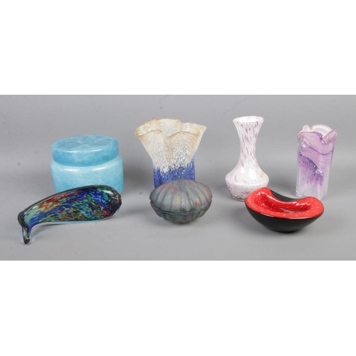 118 - A quantity of art glass, to include fish, lidded jar and flared vase.