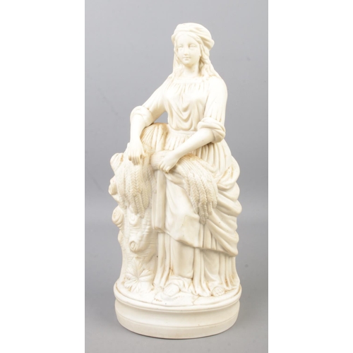 119 - A 19th century Parian figure of a maiden collecting wheat. Height 32cm.