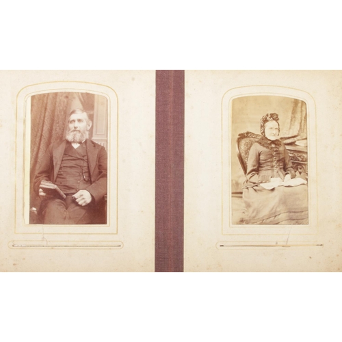 123 - Two Victorian photograph albums with contents of 19th century portraits of men, women and children.