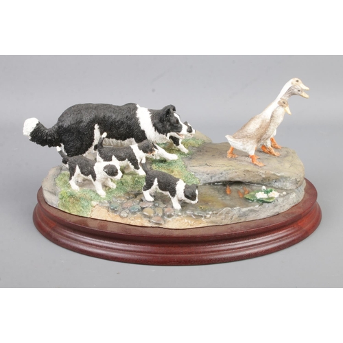 47 - A limited edition Border Fine Arts ceramic figure on plinth titled 'Keep On Running' (B1207) depicti... 