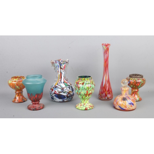 58 - A collection of 'Splatter' glassware, to include scent bottle and vases.