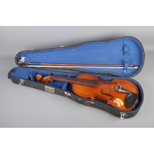 62 - A Blessing violin with bow and fitted hardcase.