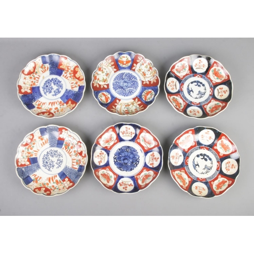 66 - Six Japanese Meiji period Imari plates, including two pairs. Approx. diameter: 21.5cm.