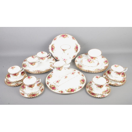 67 - A collection of Royal Albert Old Country Roses ceramics to include dinner plates, milk jug, cups and... 